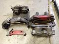 Calipers with cages and adaptor brackets. All genuine GM.